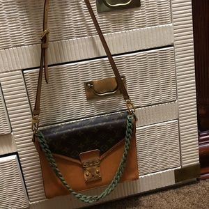 Authentic Louis Vuitton biface with strap